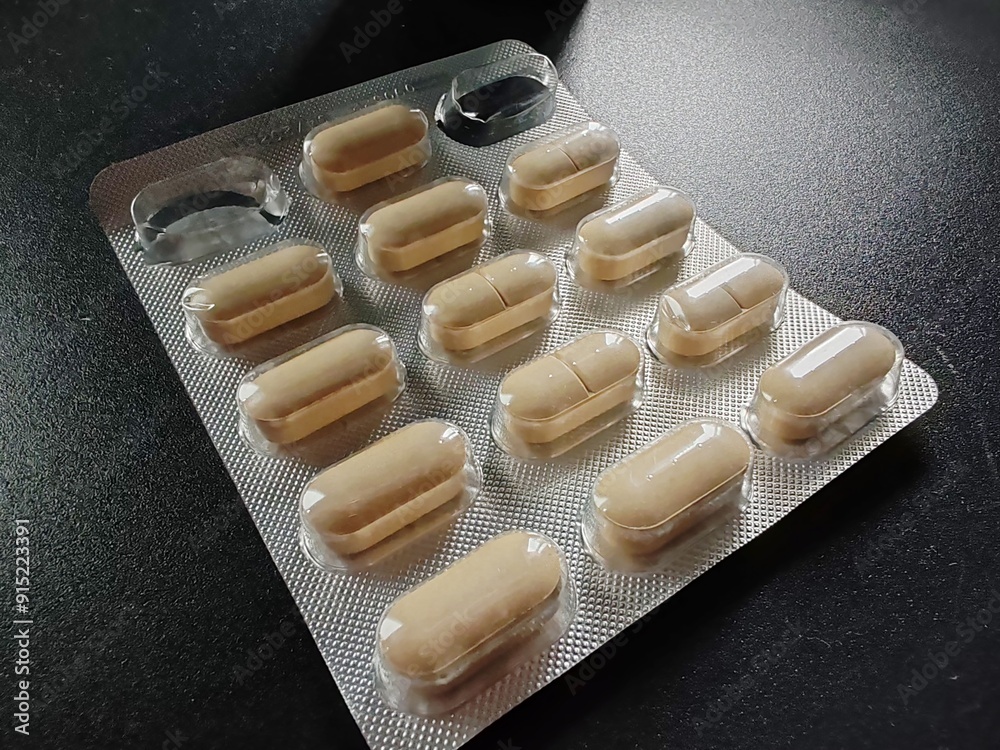 Poster tablets in a wrapper.