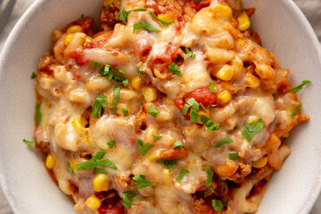 Homemade One-Pot Cheesy Taco Pasta in a Bowl, top view. Close-up.