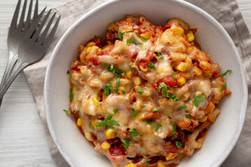 Homemade One-Pot Cheesy Taco Pasta in a Bowl, top view. Close-up.