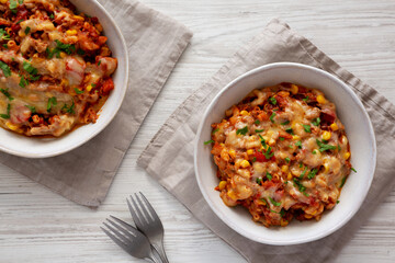 Homemade One-Pot Cheesy Taco Pasta in Bowls, top view. Flat lay, overhead, from above.