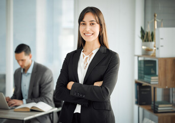 Arms crossed, portrait and smile of lawyer woman in office of law firm for legal council or representation. Justice, pride and service with confident or happy attorney in workplace for counsel