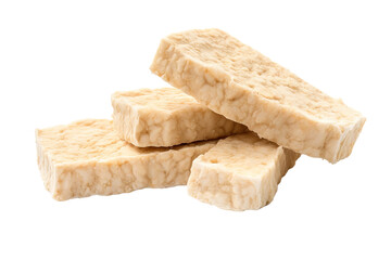 Delicate Tempeh Blocks Displayed Artistic Arrangement on a Clean White Surface on Transparent PNG Background.