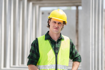 Engineer man in hardhat working at construction site, Foreman worker on a construction site