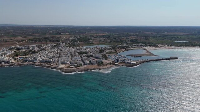Torre San Giovanni is renowned for its long white beaches of incredible beauty and quality combined with a particularly light blue and transparent sea with shallow waters for very long stretches