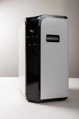 Oxygen concentrator machine on white background. Treatment equipment from hypoxia, coronavirus and other respiratory diseases.