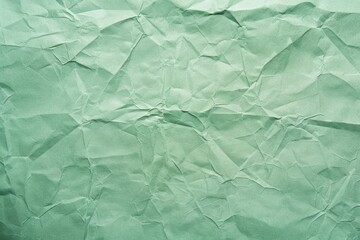 Obraz premium Crumpled green paper texture