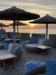 lounge chairs and umbrellas on the beachSea  
Summer  
Solitude  
Rocky beach  
Ocean  
Seclusion  
Coastal  
Tranquility  
Scenic  
Shoreline  
Serenity  
Escape  
Nature  
Vacation  
Blue waters  
