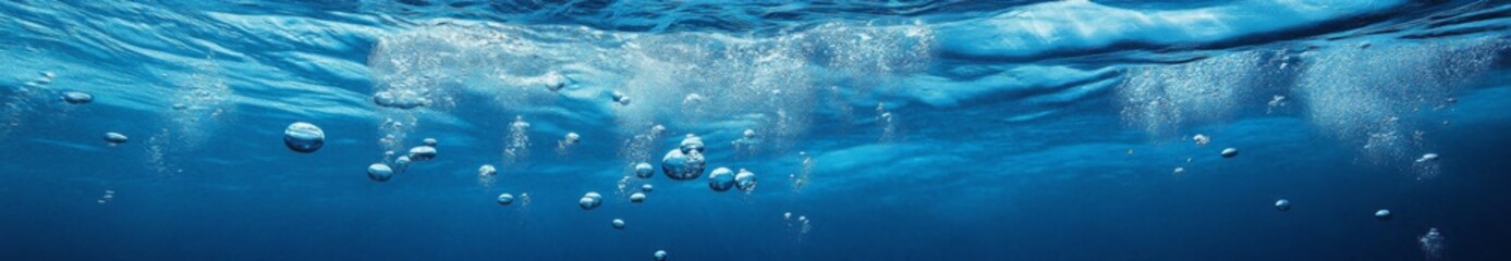 Undersea Tranquility: The Serene Vista of Bubbles Rising Through the Deep Blue Ocean, Capturing the Peace and Mystery of the Seabed World