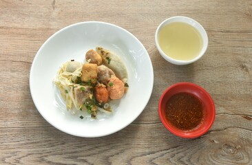 dry steamed Hakka meatball made from chop pork stuffing fried tofu with bean sprout on plate dipping chili sauce and soup