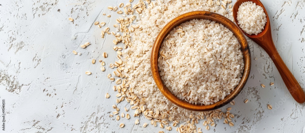 Poster Psyllium husk in a bowl with a spoon on a white background. with copy space image. Place for adding text or design