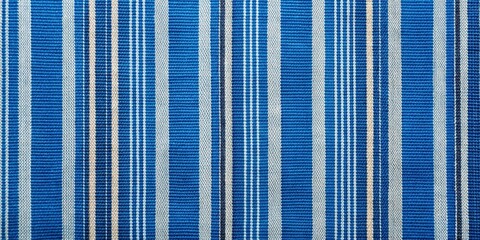 Obraz premium Blue striped fabric with a textured design, striped, fabric, blue, texture, pattern, material, textile, background, design, cloth