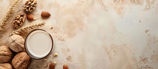 Cedar nut milk on a beige table background A non dairy milk alternative A concept for healthy vegetarian food and beverages Copy space top view
