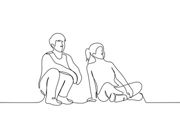 man and woman sitting on the floor looking in one direction - one line art vector. concept couple watching tv together or students on the grass