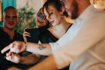 Young professionals collaborating in an indoor business meeting. They are discussing strategies and showing teamwork for a successful startup and growth.
