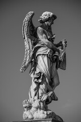 Fototapeta premium Statue on Ponte Sant'Angelo in Rome, Italy