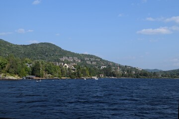 lake view from Lake Tremblant towards Mont-Tremblant mountain village, Laurentian Mountains Quebec Canada 