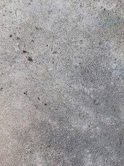 Texture of the road's gray asphalt as a background