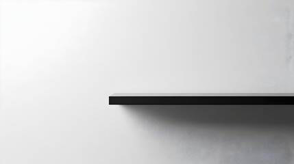 Obraz premium Minimalist Black Floating Wall Shelf in Bright Interior Space