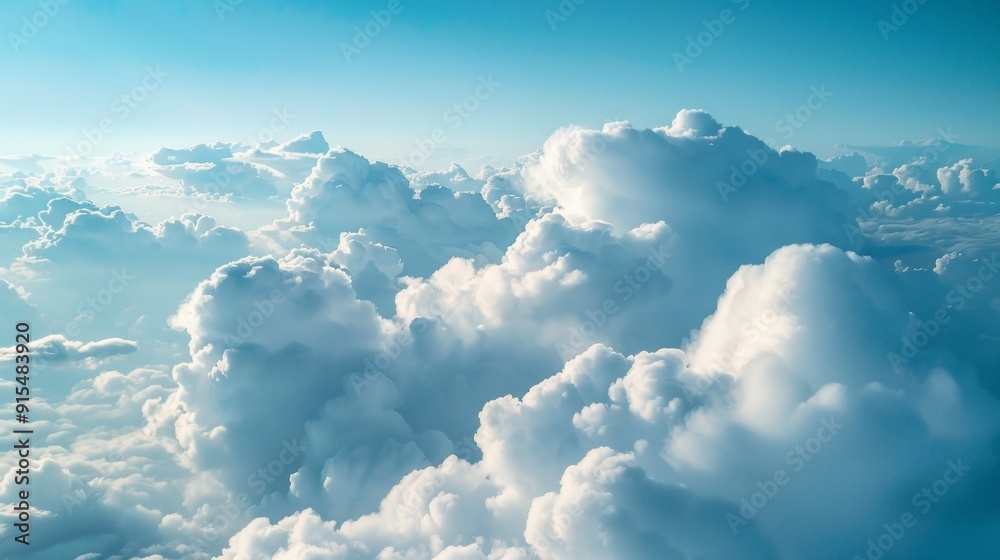 Poster the sky is filled with fluffy white clouds, creating a serene