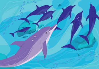 The underwater world with dolphins in blue water