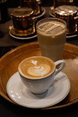 Coffee drinks on wooden tray