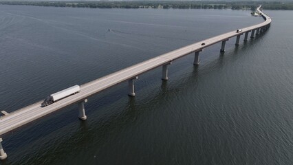 Cars and trucks crossing Lake Champlain bridge on New York, Vermont State Border