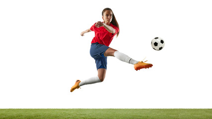 Fototapeta premium Woman, focused scorer, football player, dressed comfy sportswear, leaping in mid-air, aiming to opponents gates on green stadium. Concept of women and sport, team games, movement, victory, action. Ad