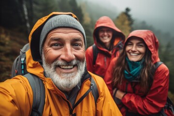 Smiling portrait of senior hikers taking a selfie