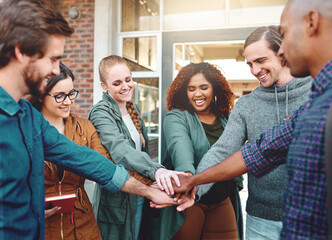 Happy, group and students with hands stack for support at university, agreement and synergy of studying goal. Diversity, smile and people with team building, trust and learning for education growth