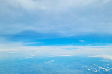 Soothing Sky Horizon: Aerial View of Blue and White Cloudscape - Perfect for Print, Posters, and Digital Design