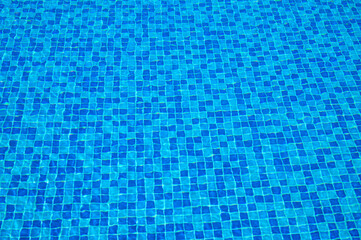 Texture of water in swimming pool for background