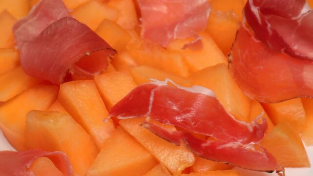 orange melon with hamon. pieces of orange melon, rotation in circle. Cantaloupe melon, Turning. 