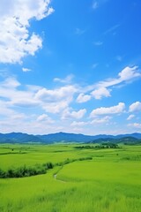 Obraz premium Serene landscapes with mountains and clear blue skies on sunny days.