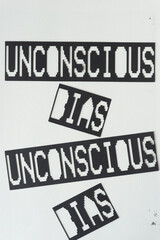 machine-cut black paper sign with the phrase 