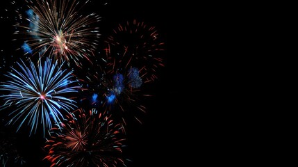 Obraz premium Colorful Fireworks Display in the Night Sky