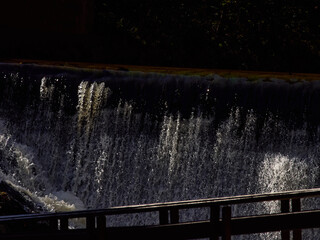 Water falls  in a net.