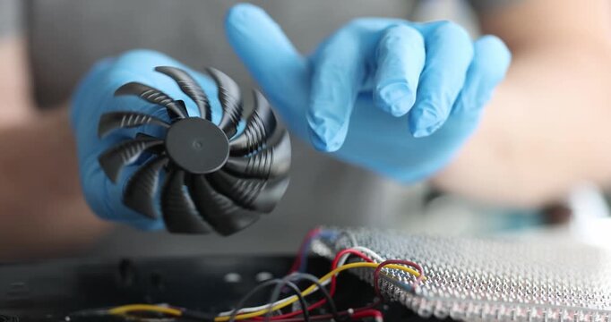 Engineer dismantle cooler cooling fan remove dusty parts. Cooling system maintenance problem outdated technology concept