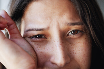 Portrait, stress and sad woman with tears, crying and mental health with depression, sad or...