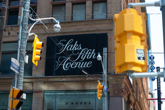 sign at Saks Fifth Avenue, a department store, located on floor one of Queen Hudson's Bay (main entrance at 176 Yonge Street) in downtown Toronto, Canada