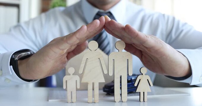 Agent hands protect family and property. Auto home insurance and life safety and health concept.