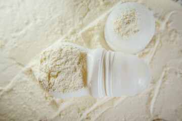 White deodorant antiperspirant on a white background in white powder, talc