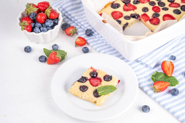 Mixed Berry Sheet Pan baked Pancakes, simple idea recipe. with fresh blueberry and strawberry, copy space