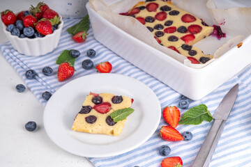 Mixed Berry Sheet Pan baked Pancakes, simple idea recipe. with fresh blueberry and strawberry, copy space