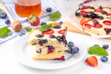 Mixed Berry Sheet Pan baked Pancakes, simple idea recipe. with fresh blueberry and strawberry, copy...