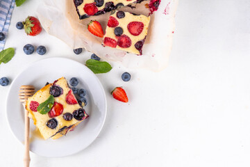 Mixed Berry Sheet Pan baked Pancakes, simple idea recipe. with fresh blueberry and strawberry, copy space
