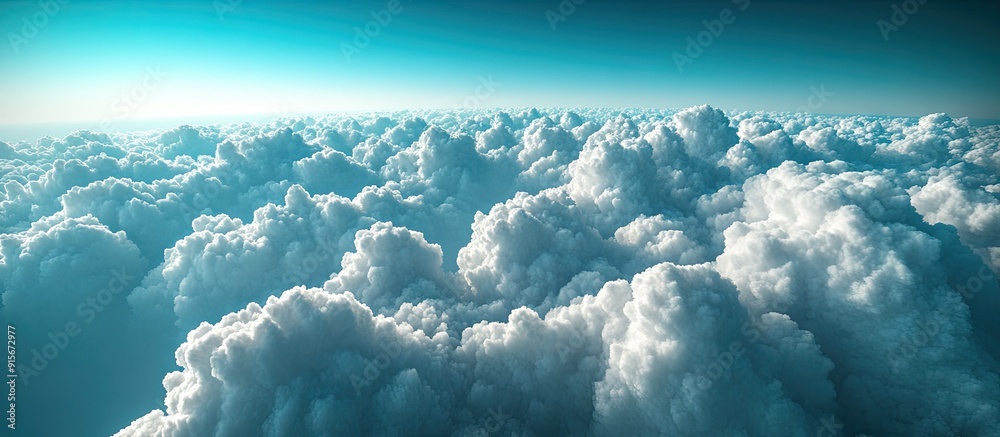 Leinwandbilder aerial perspective of white cumulus clouds against a turquoise horizon. with copy space image. place