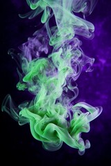 Fototapeta premium Abstract colorful smoke art in purple and green hues on a dark background.