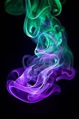 Obraz premium Abstract colorful smoke art in purple and green hues on a dark background.