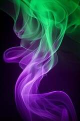 Obraz premium Abstract colorful smoke art in purple and green hues on a dark background.