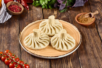 Delicious Georgian Khinkali Dumplings on Plate - Traditional Cuisine